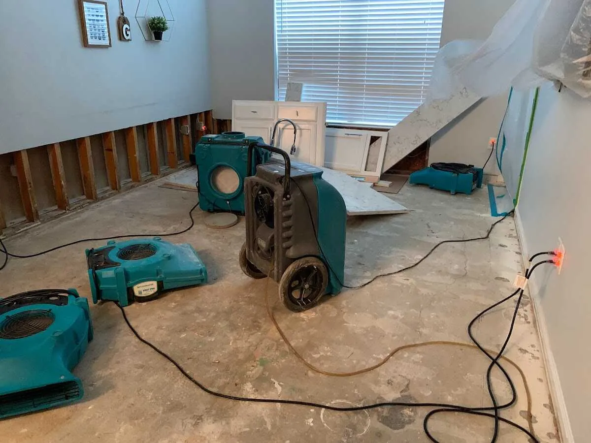 Dehumidifier in flood-cut room for Water Damage Restoration in Lake Tapps